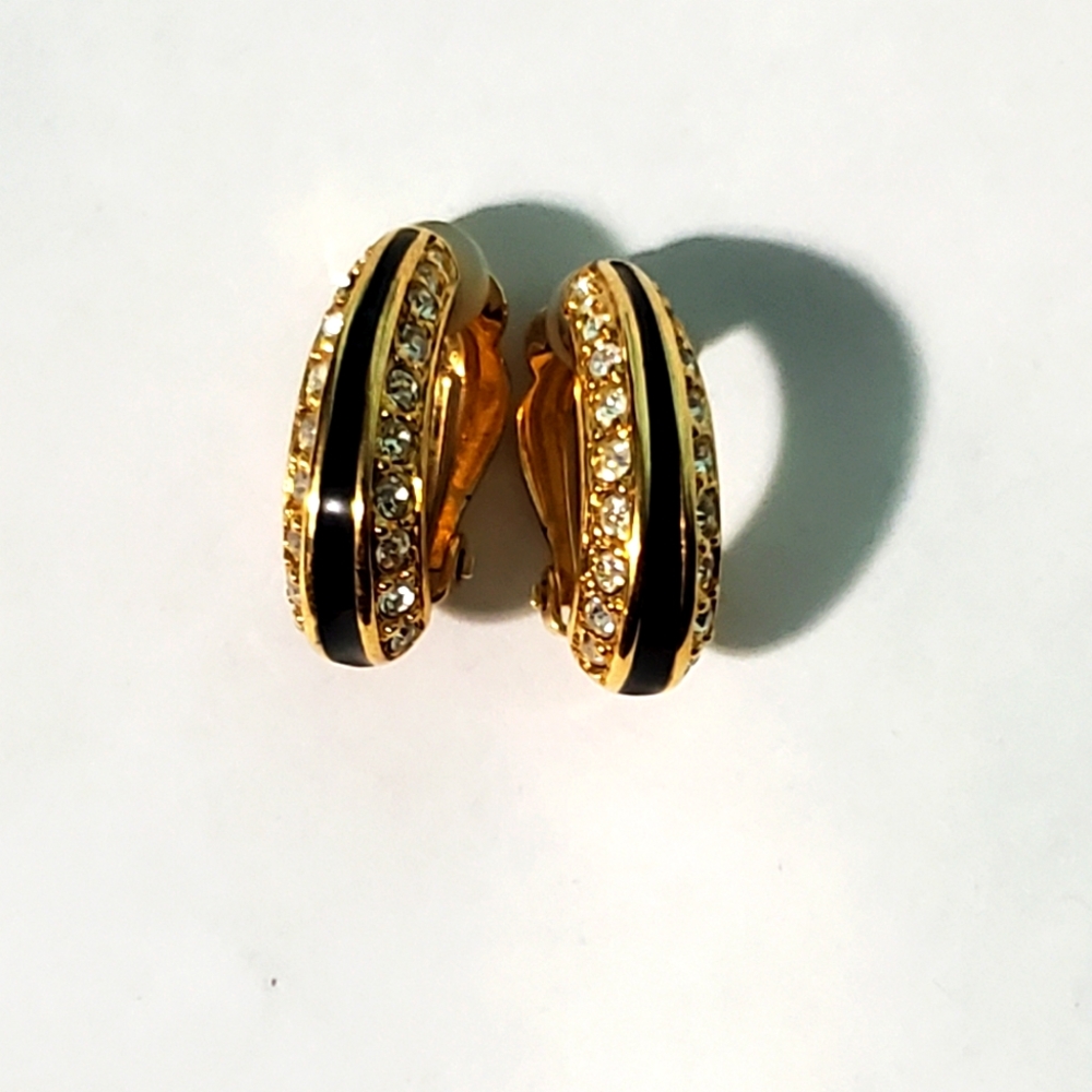 Vintage Swarovski clip on earrings gold tone with black enamel